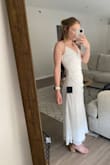 I'm typically not a dress gal due to my large hips and small bust but this dress is stunning. The cinching across the stomach really accentuates the waist! 10/10 recommend - Madi K.
