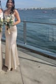 Beautiful color, cheap fabric that snags so easily. Wore once to a wedding, and by the end of the night, the dress was ruined. The breast area was very large I had to take it in and get it altered in that area plus the length was so long. The waist area shows every single line and pudge. Couldn't get away with wearing a Spanx because it showed - Tanya W.