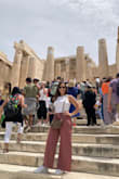 For someone who doesn't like wearing shorts, these flowy comfortable pants are just perfect to pack on your next vacation! I wore them all day touring around Greece, paired with a white pair of puma sneakers. I did take them to be hemmed about 5 inches to be able to wear with flats, as I am a shortie! Outfit also looks super cute with a pair of wedges. Very versatile! I'm usually a small/medium (I have a big butt and thighs). I ordered the medium, but a small would probably work too since they are stretchy. Definitely will be ordering the black pair as well :) - Ashlee K.