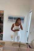 This pant and top set are so cute! I got a lot of compliments on it! It also fits so well, and the quality is amazing! Not see-through at all. I got soaked in a Florida rainstorm running into the restaurant and it wasn't see-through like many white outfits would be. I'm 5'5" so the pants are a little long, but perfect length with heels! - Emily F.