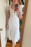 I absolutely love this dress!! It's everything I was looking for and looks just as good in person. It's flowy, it's feminine, and it fits SO WELL! Good cut, good quality fabric. I got it for my engagement party at a brewery and it's definitely the kind of dress you could dress up or down depending on the occasion.
The only thing that keeps me from giving it 5-star perfection is that seams of the sleeves are sewn on top of the bust area. Odd to see it on top when it probably should've gone underneath, but it's not preventing me from returning the dress by any means. The rest is so pretty, it's hard to notice! - Hillary B.