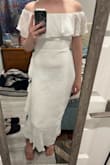 This dress is so nice, the material is good quality and it's very comfortable. There's not much give in the material, but the small size fits me very well. It is longer than I expected but I'm also pretty short. Can't wait to wear this for my rehearsal dinner! - Emily L.
