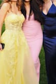 The dress was very nice but was loose at the waist even though I have a relatively normal-sized waist. The low cut is very flattering. I had to get it tailored at the waist but it ended up looked great! - Jenna A.
