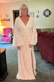 My husband and I are renewing our vows in April 2024 at our favorite beach in Florida. I had purchased at very simple dress Ana then saw this one and fell in love wit it. I have lost 50 lbs and just was not sure if the sizing. I started out with a XL then a 1XL both would not zip up the back. When I got the 2XL it fit perfect! The company is great with the returns!! So happy the last one fits!! (Also my face looks awful& I was trying to get my 82 year old mother to take the pict on a phone she does not know how to work. ># - Kelly C.