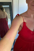 This dress is very pretty and soft. It hits just below the knee with an embellishment at the waist that allows for a strip of semi-see-through action. The neckline is a bit higher than seems to be represented in the product images, although that may have something to do with my bust. The straps tie at the shoulders, which I don't love because it's hard to get them even by yourself. The material gives it lots of motion and allows for maximum comfort! I could see myself wearing this dress to a formal occasion. Unfortunately, I don't have any coming up so I sent this beauty back. - Sarah W.