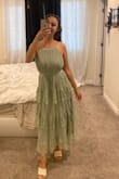 It fits perfectly! It tight at all, I even feel like I have a little space around my stomach should I bloat. Perfect length for a shorty like me too. - Erika M.