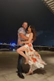 I wore this outfit for my rehearsal dinner destination wedding in Cancun. The theme was tropical and got so many compliments. It was also comfortable but if it's windy hold on or you may flash everyone lol - Lucia A.