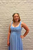 The fabric is really nice and feels more expensive than it is. The color is lovely and the cut of the dress is very flattering, I was able to wear a normal bra with it which is huge! My only problem was that the large fit great for me other than being too long to wear without high heels. - Daisy G.