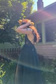 Absolutely loved it. Normally a medium but I have a smaller chest so I got a size small (was good for the self esteem lol) and it fit PERFECTLY. I felt stunning and it was great for the 80 degree sunny day. I'm pretty tall and it still touched the floor even with platforms which was a lovely surprise. When I bent forward the dress did however gape at the front so I ended up sewing the lace under part to the top layer, which only mostly helped but I still had to be mindful. I think that had to do with my body type more than the dress. It also arrived two days after placing the order which was GREAT because it was somewhat of a last minute choice. - Cassandra C.