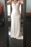 This dress is beautiful and fits true to size. It is just not very forgiving, even with shapewear to smooth things out, you could still see the lines. Otherwise very comfortable. - Michelle B.