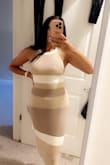 Fits perfectly, true to my usual size. Compliments my curves while making me look slim. I love this dress! - Kaitlan R.