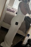 It fits pretty nice and it's not tight! Very stretchy and comfy fit. The only thing is that it's too long but I'm just short. - Kiera A.
