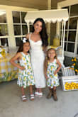 Love, love, love this dress! The fit was *almost* perfect. I had the waist taken in about a half inch on each side of the dress. I got so many compliments on this dress. If you're considering it, get it! - Amanda G.