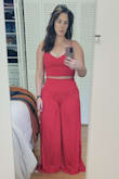 Actually really loved how this looks. The adjustability of the top was perfect for my smaller chest. The pants were too small (I typically buy a medium but in most lulu I'm a large). The pants were extremely see through. I tried them on wearing black undergarments and I could see them. I could even see my tattoo through them. I thought about wearing shorts under but the slit is so high that it wouldn't have worked out. Great color though! - Kathleen S.