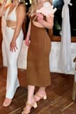 Dress fits like a glove, very stretchy and comfortable, got a lot of compliments on it! - Arlinda K.