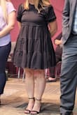 This dress was perfect. The length was just right for my height.  The elastic on the sleeves is a little tight but it never bothered me. I did experience my hair tangling on the button on the back of the collar. - Emily D.