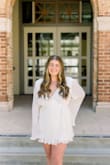 This was the perfect grad "dress" for my law school graduation. It was so flattering and perfect for my graduation and pictures. It was a little loose in the top part if you don't have very broad shoulders, but other than that, it fit perfectly. I got tons of compliments on the skort aspect. - Amanda E.