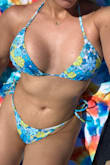 Very flattering bikini and top. Love the color! - Yokarla V.