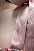 The fabric is beautiful and overall I really love it. I will have to take in the pockets like others have said. I'm just disappointed that the sleeve came with a noticeable stain. I'll try to get it out because I don't have another option for this wedding. - Katlyn C.