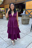 The straps are a little long on me so I originally had to pin them shorter before getting it tailored but the rest of the dress fits great! Makes me feel like a princess! The color is a bit more purple than I expected (looks more maroon in the photo) but I love it even more - Donovan E.