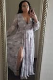 I'm a curvy gal and this dress is definitely graceful and complimentary to my shape (lets me breathe in all the right areas). I have a heavy bust (but I love how this accentuated that area). The slit was definitely welcomed and came in handy on the dance floor (ventilation if you know what I mean). Fantastic buy! - Venus V.