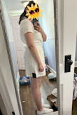 5/5 because I love love love this dress! It is so flattering and so comfortable. It was a smidgen tight around the arms if I bent down in the wrong way, but that is a very minor complaint. It fits so well and is true to size. The sash is not attached but there is a loop on each side that helps hold it in place. There's an elastic band in the middle of the dress that really makes the fit great. I will probably have to take a cool iron to it to get the wrinkles out before I wear it out, but again just a minor inconvenience. I bought the Keds Triple Kick White Platform Sneakers to go with it (almost identical to the Keds the model is wearing) and it is a fantastic combo. The sneakers are slightly whiter than the dress which leans ever so slightly ivory, but you can hardly tell unless you put them right next to each other. I would definitely recommend this dress! - Mia E.