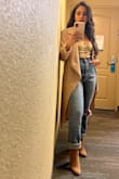 I wore this during the fall and paired it with booties and a long coat. I received so many compliments. I can't wait to transition this top in the spring. For reference, I have small boobs and the top half fit just right. - Rocio Z.