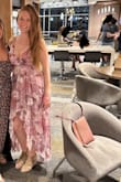 Love this dress and a great fit. I will say it showed a little more cleavage than I typically like for myself. I recently had a baby so I was looking for a flowy dress and found this to be really flattering. Love the color and print. It was perfect for my sister's rehearsal dinner! - Chrissy B.
