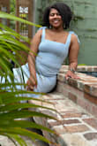 This dress nicely accentuates my body. I usually order a M, but went up. I also think an XL would've worked, because this dress is so form-fitting. Nonetheless, this dress is a stunner!!! - Jasmine J.