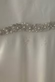 I loved the way this looked. I used it only once, but by the end of the night, the dress was shredded. - See E.