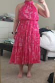 I typically wear medium or large in Lulus, with most items being more comfortable in a large. I bought both, and they were way too big. I didn't even try the large because the medium was so large. The waist is fitted, but it is elastic, so you can go down in size  because my problem is usually the waist in smaller sizes. The top above the waist was so baggy that I had to pull it down to my belly button to fit right. The small was perfect, and the fit is very comfortable. - Stephanie C.