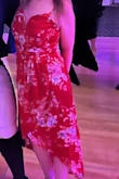 It is a little sexy while still staying classy.  Originally ordered in xs and sized up to small because the torso was very tight. It was so comfortable and I had no wardrobe worries for the 2 weddings I wore this to.  The dress got several compliments. The chest is tight, so I would not recommend this for girls with larger bosoms.

There is minor fraying.  Strings sticking out at the seam and random places.  This wasn't the quality I was expecting for such a pricey dress but I love it so much anyway. - Lauren M.
