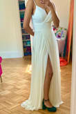 This dress was absolutely beautiful. It fits true to seize and Looks as pictured. Unfortunately it was too long for me, but other than that everything was perfect. - Bezawit O.