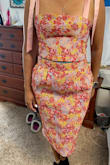 I had a dress from Lulus a med was slightly small. I dot a large this time it was too big. I had the length of skirt altered along with it taken in. The top altered to have taken in plus cup area so no need for a bra. I received too many complements to count. This photo seamstress took so heels were not on. - Raegan H.