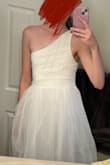 Fabric is terrible and so uncomfortable. The way the one shoulder is cut looks terrible. Just look at the rough tulle of this skirt! It's funny because the individual packing for this dress says "quality fabric" which it definitely is not.
The middle was so scratchy on the inside. I'd expect this quality from a $15 dress. Honestly, I was a bit baffled by how bad it was lol - Annika H.