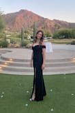 This dress was a showstopper at the wedding. I received so many compliments and felt so confident in it. The material is good quality, cut and pattern are great, and the little line of grip at the top of the neckline made it so that it didn't move. I couldn't lift my arms in it but that's not a big deal. - Joliene P.