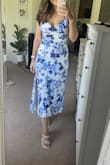 This dress is soooo comfy and fits me like a glove. Perfect midi length on me. I ordered my usual size medium, I'm 5'5, 138lbs, 32DD. I don't even need a bra. It did come slightly wrinkly so I'm hoping after a steam it's fine and doesn't wrinkle too easily. 10/10 recommend - Courtney M.