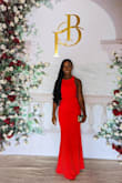 First of all, the color is beautiful, radiant, and rich. It fits perfectly and elegantly. Not too tight, not too loose. The dress is sewn neatly. I love the lining under the dress, it protects the dress from having sweat marks. It shows just the right amount of skin at the back. I got loads of compliments and I felt absolutely gorgeous and rich in this dress. 
If you want to make a statement or turn heads at your event without saying a word, this is the dress! - Chisom I.