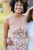 I bought this for an outdoor photoshoot and while it was very cute, I kept having to pull up the top to keep from being exposed. I definitely recommend using fashion tape to keep the top in place. - Ayanna I.