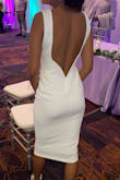 I needed to wear a white dress to attend a tropical wedding and this one was perfect! I originally ordered an XS because I was nervous it would run big, but the S was perfect. - Ayanna I.