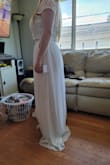 I was nervous at first but took a chance. The dress was delivered in 2 days. The quality was a pleasant surprise. I had to have the dress altered to fit my body, but I'm quite happy with my purchase. The dress was larger than expected. Alterations are not complete yet, but my seamstress said it will be an easy job and nice material to work with. My only wish is that I could get a flower girl dress from here as well. - Alycia S.