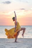 Perfect influencer vacation dress! (>p This dress is much heftier, higher quality than a lot of my Lulu dresses. It flows with the wind so beautifully. It captures so well! The movement, the color, the fitting! The best golden hour dress. Wore it in Maldives and Belize. It may feel loose on the chest part but with strap adjustment it fits well. Size 34b, size 26 pants, size 4 dress. Got it XS. It fit me best when I weighed about 124 lbs. It still fit me when I gained weight-135 lbs. I want this dress in red!!! More photos on my insta if you're interested @momnicat - Monica C.