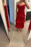 I was hoping I would love this dress but it's not for women without boobs. There was a lot of extra fabric in my chest area I couldn't fill. It also felt wider than I would have liked. I ordered a small and wished I could've tried a XS on before my event. Very cute tho! - Jess H.