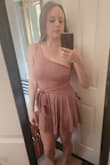 I have a long vertical line, and this outfit did not honor that (looked too short or something). Could see this on a Britney Spears or Scarlet Jo body type. Otherwise material was soft and color was beautiful. - Jessica F.