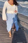 Bought this to wear over a summer midi dress. Perfect for a beach day or day/night out. Light enough to put in a small purse when not needed, but keeps me warm when I need it. Got so many compliments on it! The size was perfect, snug but not tight. I like how the bottom cinches if you want. - Patricia M.