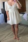 I wore this to go shopping for wedding dresses and it was such a fun dress! I ordered a large first and ended up exchanging it for a medium because the sleeves were falling off my shoulders. The chest stretched a bit throughout the day so I felt like I was pulling it up by the end of the day, but overall loved the dress and will definitely wear it for more wedding festivities! - Abby D.