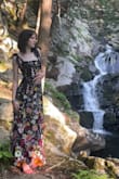 I love the material of this dress and how the flowers are 3d, it really adds so much character. I also love how you can adjust the shoulders depending on your body. Definitely much better of a price than many other semi formal dresses! - Olivia S.