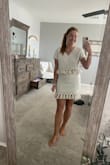 I purchased this outfit for vacation and could not be more pleased! It fits perfectly, looks adorable, and is nice material. The fit is true to size. I ordered a medium top and a medium skirt. The material does not have much give so if you are blessed with bigger hips or bust I would recommend sizing up. - Ashton M.