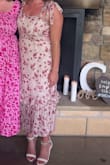Absolutely love everything about this dress! The fit is perfect. I usually order a size small but this dress does not have stretch and with having a larger bust (34DD), I sized up to medium and so happy that I did. It fit perfectly everywhere and the length was great and not restrictive of me walking. - Haley B.
