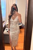 Beautiful dress, fits great with some stretch& maybe could have went with a small but decided to go with my other option! - Gabriela D.
